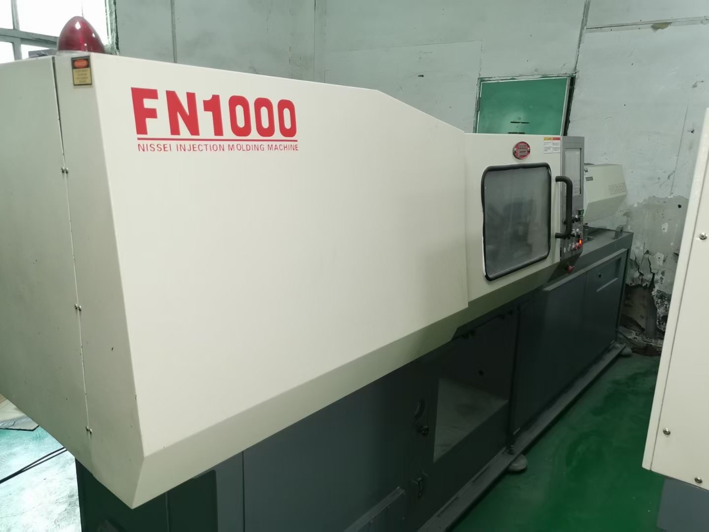 NISSEI FN1000 Mała używana maszyna do formowania wtryskowego tworzyw sztucznych do noża widelcowego